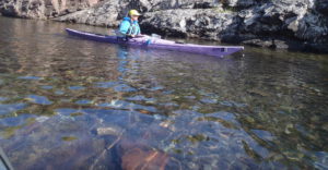 Sue paddling Rock Island