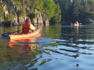 kayaking along the shoreline