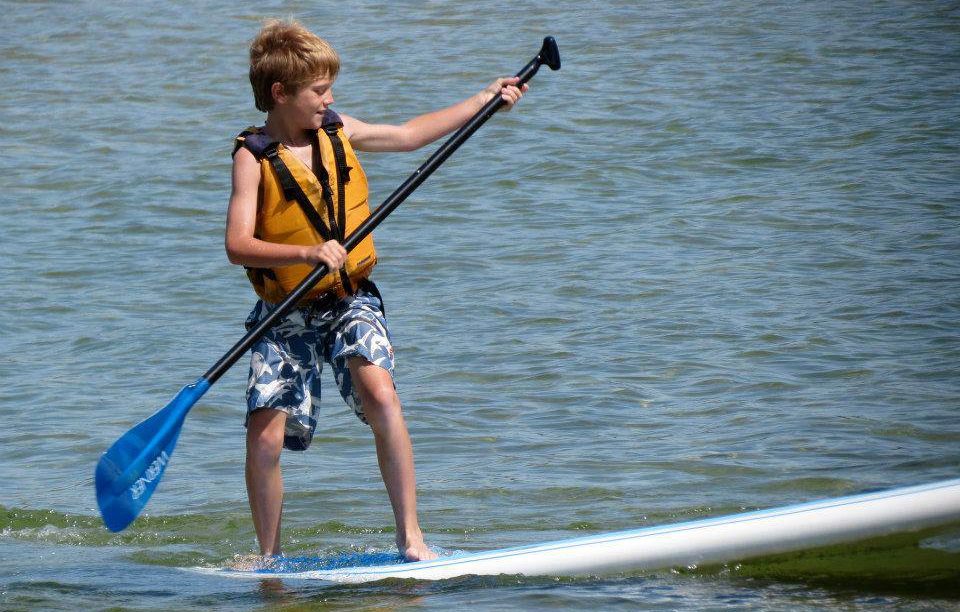 kid on a paddle board rental