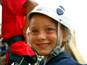 young girl zip waiting to zip line