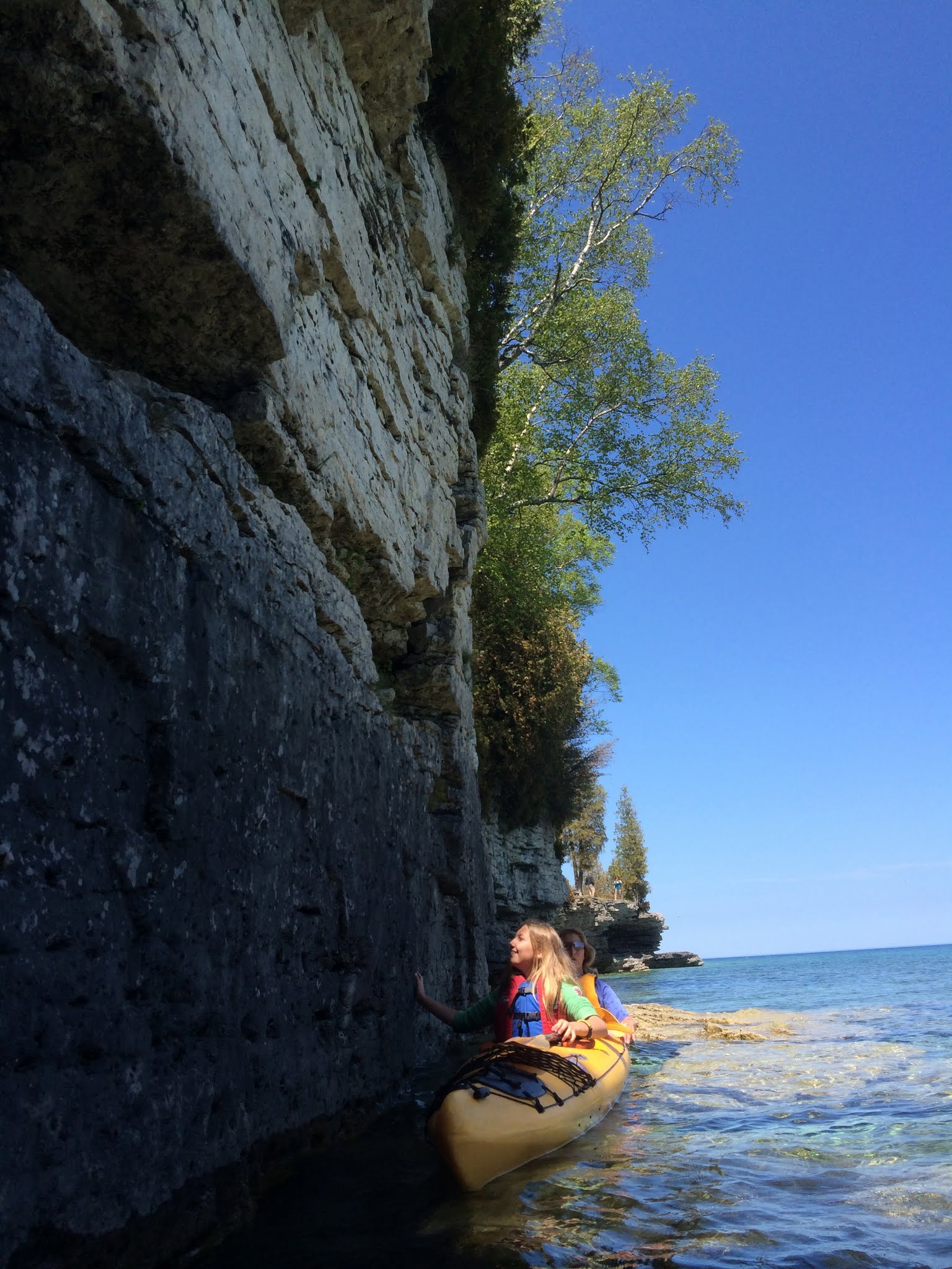 kayaker touching the Niagara Escarpment