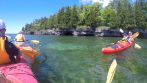 crystal clear water on the cave & dunes kayak tour