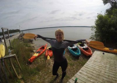 Emily with kayak paddle