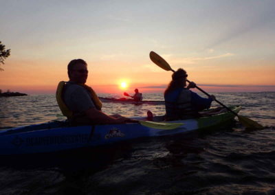 sunset kayak tour couple