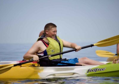 smiling while kayaking