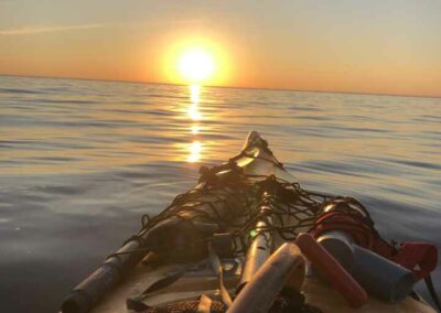 kayak looking into sunset