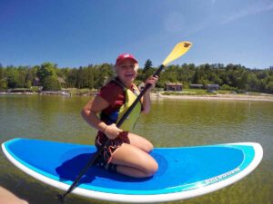 happy paddle boarder
