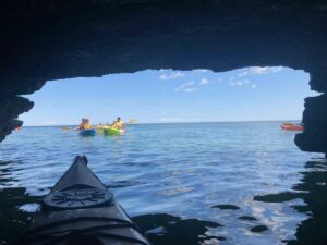 kayak looking out of a cave