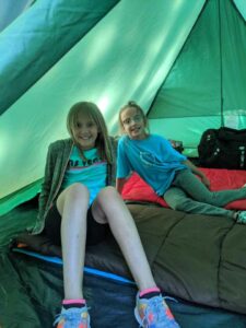 campers in their tent