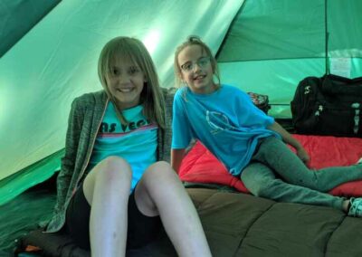 campers in their tent