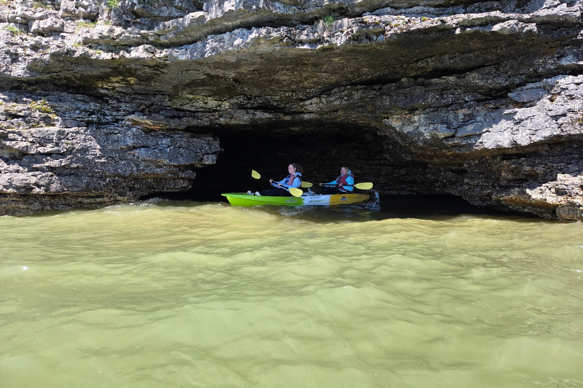 Kayaking in caves at Cave Point