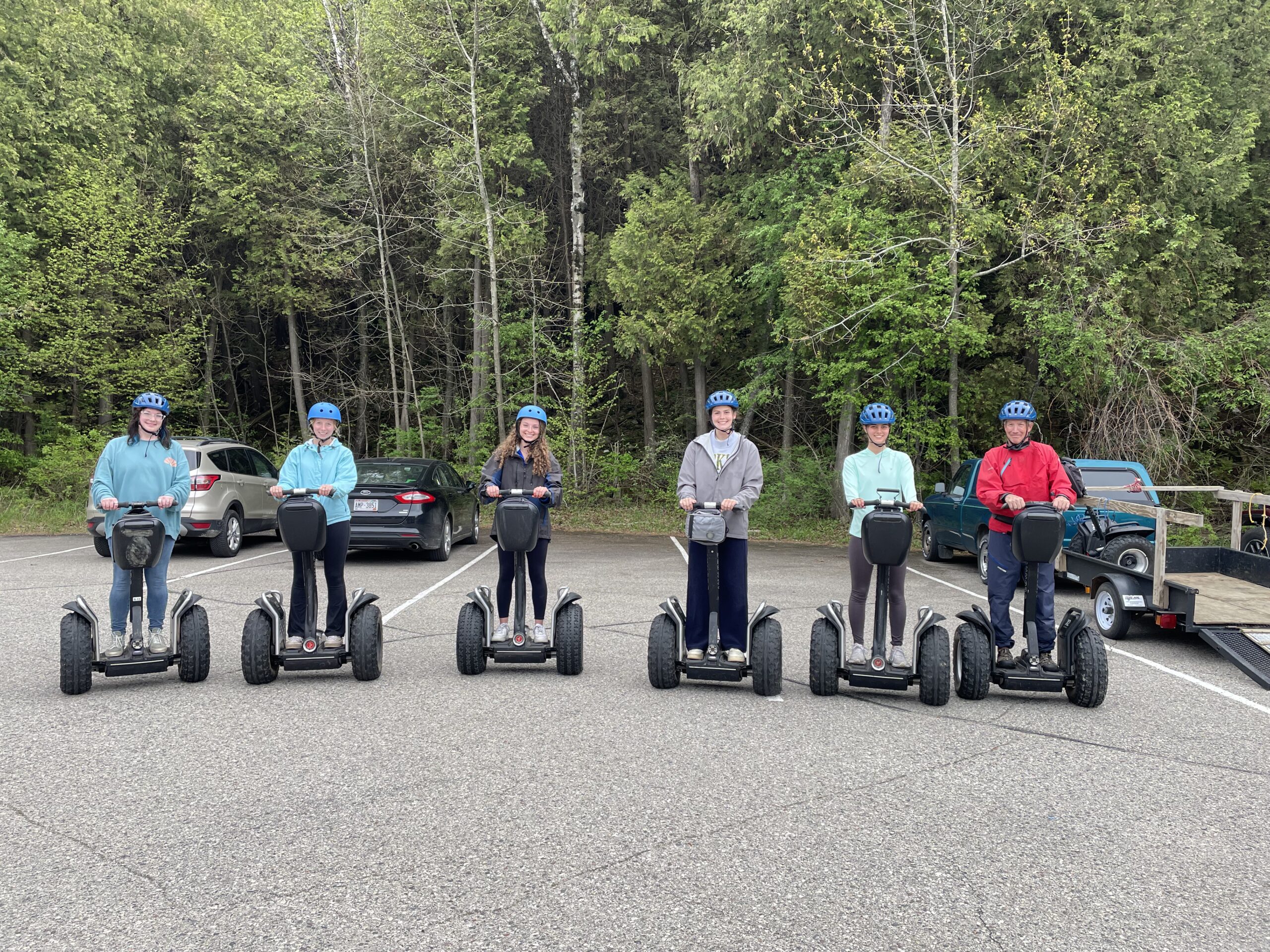 Group on a Segway tour in Potawatomi State Park that starts at the Park Store and goes around the park.